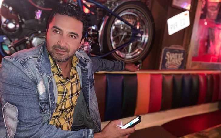Pej Vahdat in a jeans jacket.