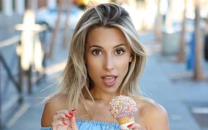 Ayla Woodruff eating her ice-cream with her mouth open.