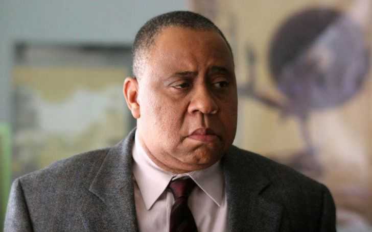 Barry Shabaka Henley posing for camera