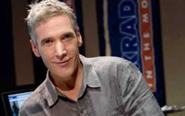 Kidd Kraddick, blonde and grey shirt.